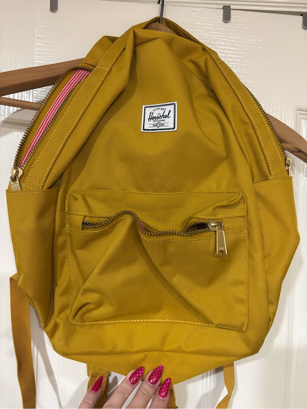 NWOT-Herschel Supply Company Mustard yellow mini backpackwith Red striped Lining